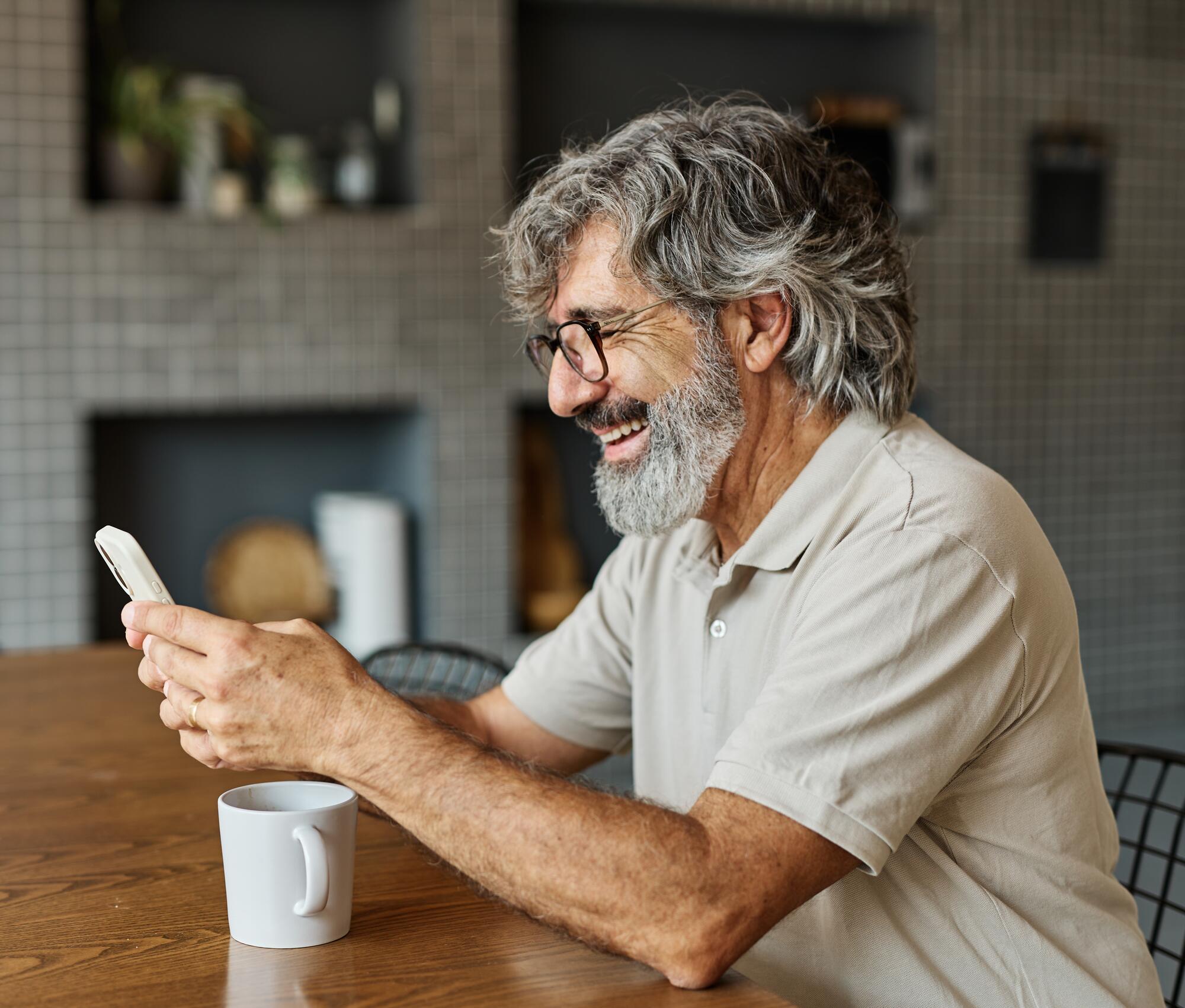 mature man looking at his finances